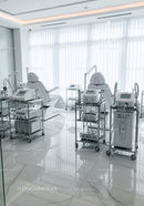 Modern Hospital Room with Advanced Medical Equipment and Treatment Beds