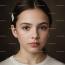 Elegant Beauty Portrait of a Young Woman with Brown Eyes and Pearl Accessories