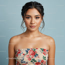 Portrait of a Young Woman in Floral Summer Top with Braided Hair