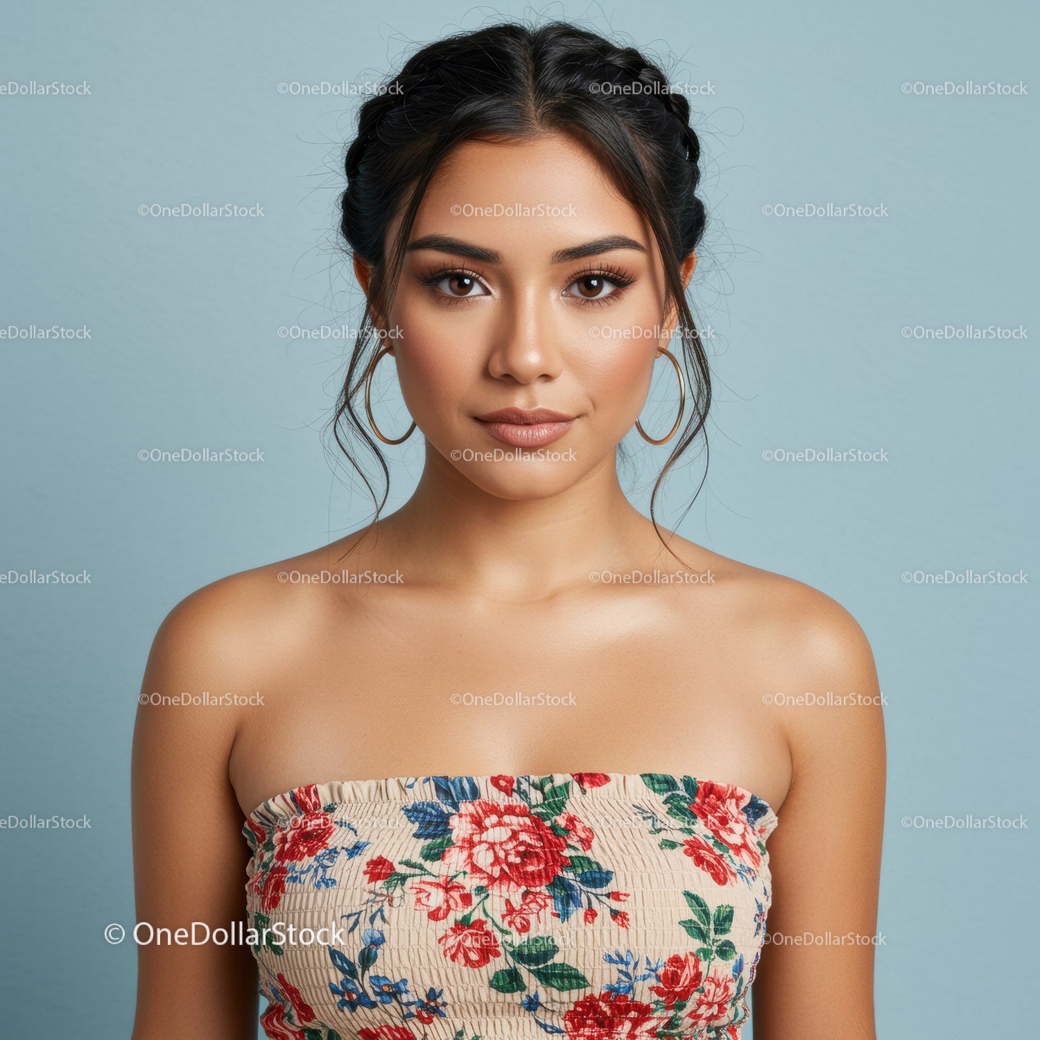 Portrait of a Young Woman in Floral Summer Top with Braided Hair