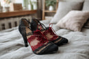 Chic Black Heels and a Red Lace Dress in a Cozy Bedroom Setting