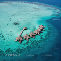 Overwater Bungalows with Clear Turquoise Water in Tropical Paradise