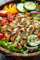 Grilled Chicken Breast with Herb Sauce on Fresh Garden Salad