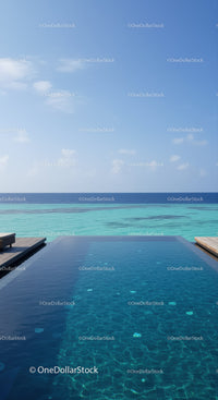 Luxury Infinity Pool Overlooking Turquoise Ocean and Clear Blue Sky