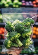 Fresh broccoli florets sealed in clear plastic bag