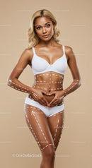 Beautiful Woman in White Lingerie with Body Markings and Confident Expression