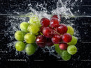 Fresh Green and Red Grapes Splash in Water for Refreshing Effect