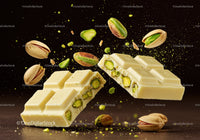 White chocolate bar with pistachio nuts close up