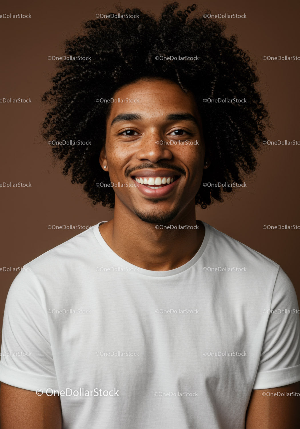 Portrait of a Smiling African-American Man with Curly Hair in Studio