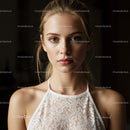 Portrait of a Young Woman with Blonde Hair and Blue Eyes in White Lace Dress