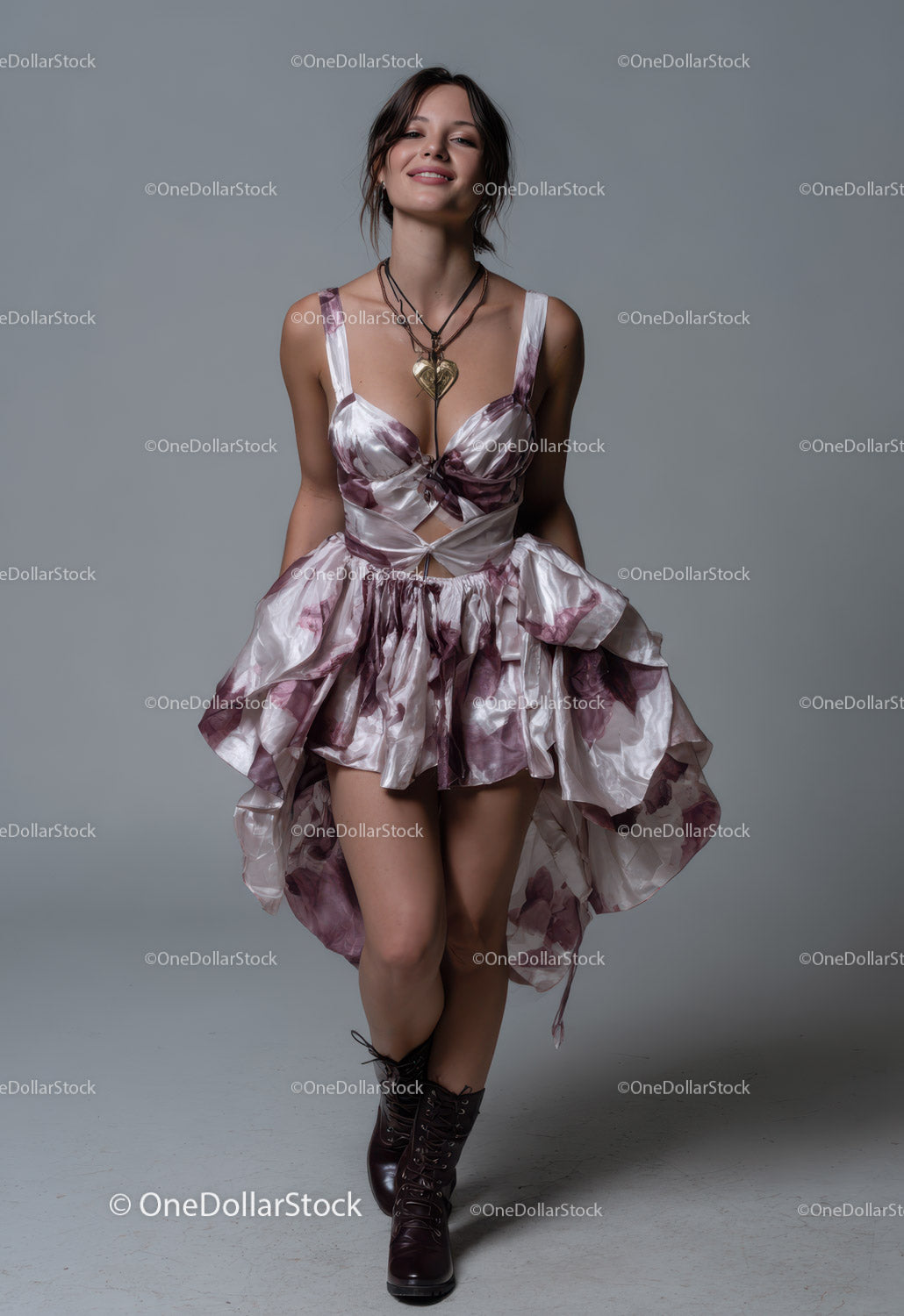 Charming Woman in Floral Dress Wearing Boots Posing Confidently