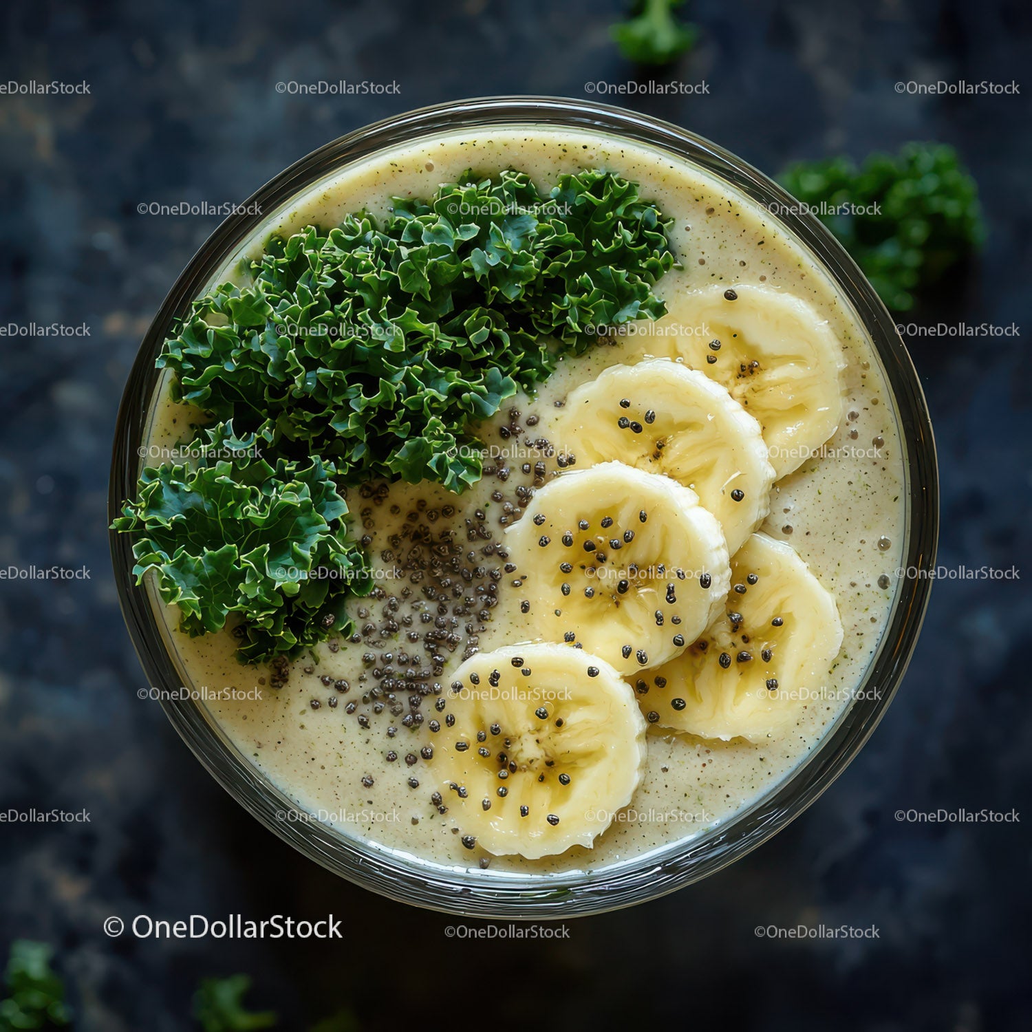 Banana Slices and Green Kale in Creamy Smoothie Bowl
