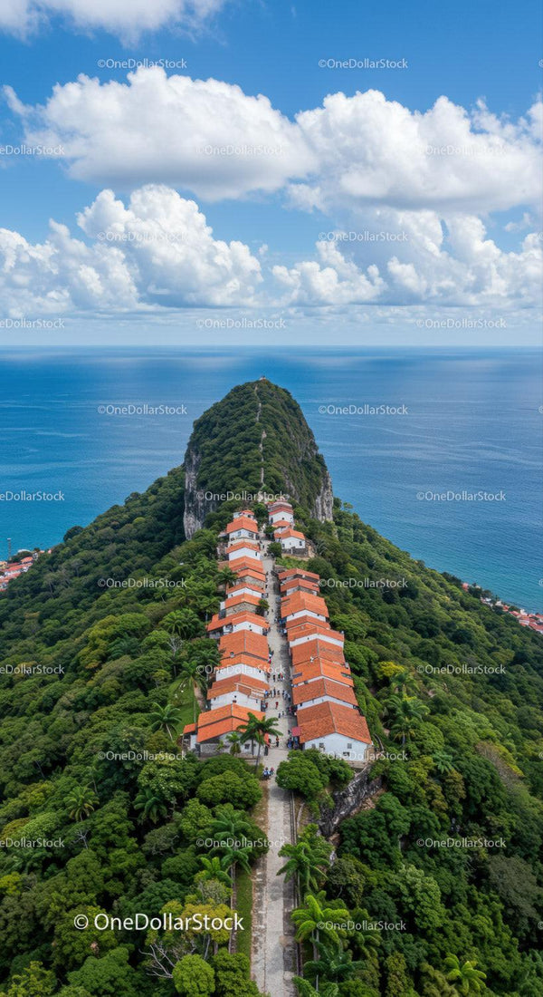 Scenic Mountain Cliffs with Vibrant Village and Ocean View