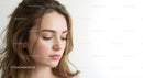 Serene Young Woman with Brown Hair in Soft Natural Light