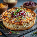 Cheese and Cranberry Savory Pie with Herb Garnish