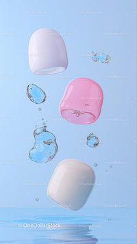 Colorful Ice Cubes Floating in Cool Water on Light Blue Background