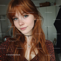 Vibrant Red-Haired Woman with Blue Eyes in Stylish Indoor Portrait