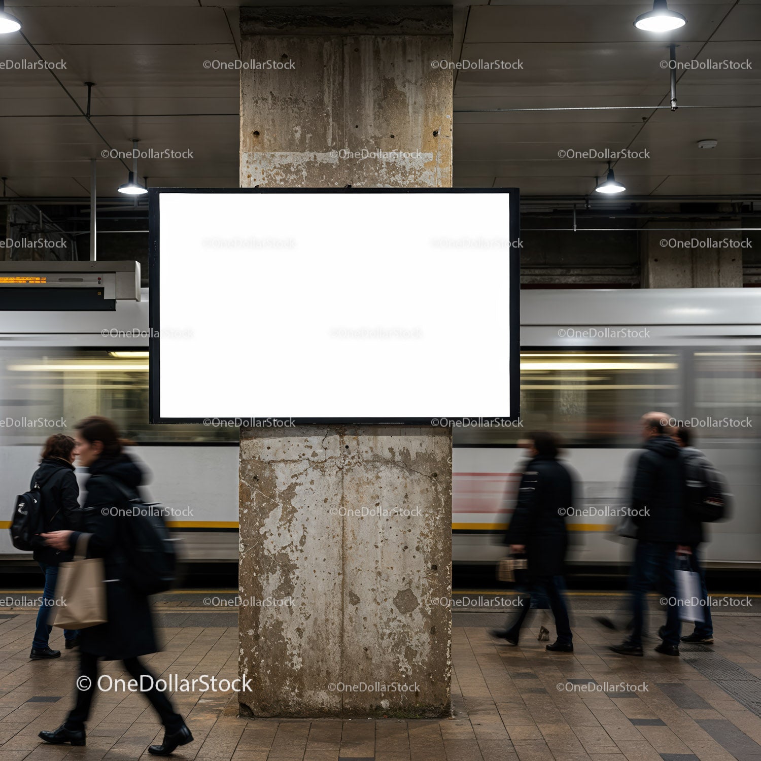 Urban commuters passing by blank billboard in metro station