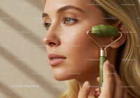Close-up of a woman with blonde hair using jade roller for facial massage
