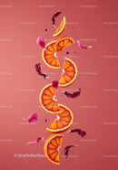 Fresh blood orange slices with vibrant petals floating