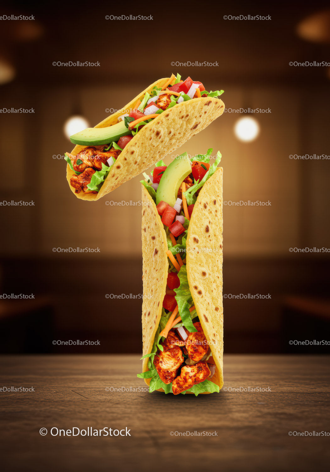 Grilled chicken tacos with fresh vegetables on wooden table