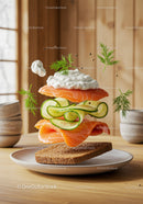 Fresh salmon sandwich with creamy herb sauce and cucumber