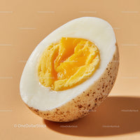 Fresh Hard-Boiled Egg with Bright Yellow Yolks and White Shell