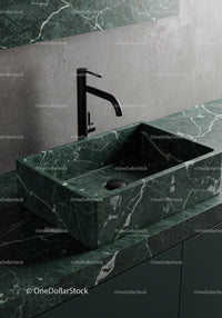 Elegant Green Marble Bathroom Sink with Black Faucet for Modern Interiors