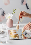 Elegant Sugar Cookies and White Orchid on Mirror Tray in Stylish Interior