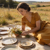 Young woman arranging flowers during outdoor picnic