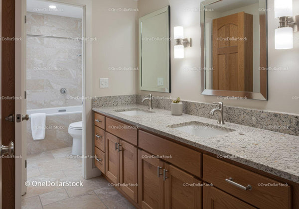Modern Bathroom with Double Vanity and Illuminated Mirrors