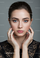 Elegant Woman with Blue Eyes and Perfect Skin Portrait