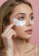 Close-Up of a Woman with Under-Eye Patches Applying Skincare Routine