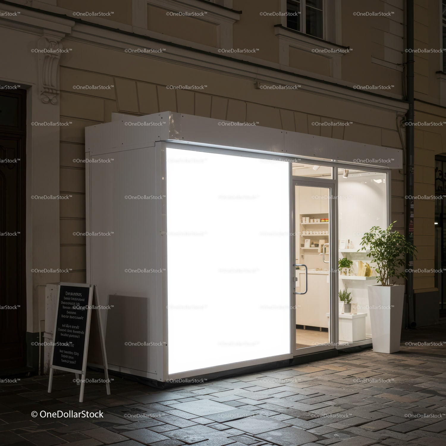 Minimalist urban storefront glowing warmly at night