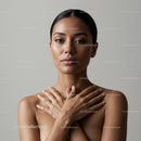 Serene woman with crossed hands embracing herself