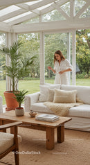 Young woman enjoying serene moment in bright sunroom