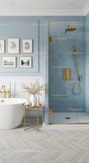 Elegant bathroom with blue tiled shower and freestanding tub