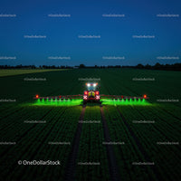 Nighttime Farming Scene with Green Sprayer in Field