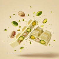 White Chocolate Bar with Pistachios Breaking Apart