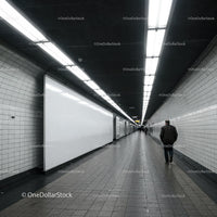 Minimalist Subway Tunnel with Tiled Walls and Modern Lighting