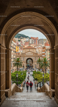 Traditional European Archway Overlooking Hillside Cityscape