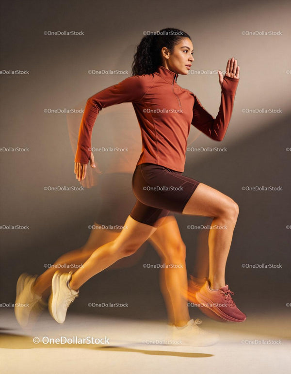 Athletic woman sprinting with dynamic motion blur effect