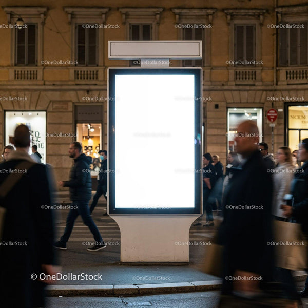 Bright illuminated city billboard surrounded by pedestrians JPG Mockup Image