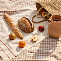 Rustic Bread and Fresh Fruits on Picnic Blanket