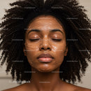 Woman with Curly Hair in Facial Mask Relaxing Skincare Routine