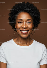Confident Smiling Woman with Curly Hair in Casual White T-Shirt