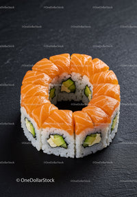 Fresh salmon sushi roll with avocado and cream cheese