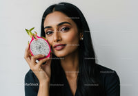 Elegant Woman with Dragon Fruit for Health and Wellness Concept