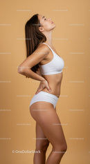 Elegant Young Woman in Activewear Performing Yoga Pose