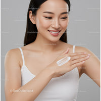 Young Woman Applying Moisturizer for Glowing Skin